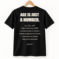 Age Is Just a Number Tee — Black — back on hanger, design visualization